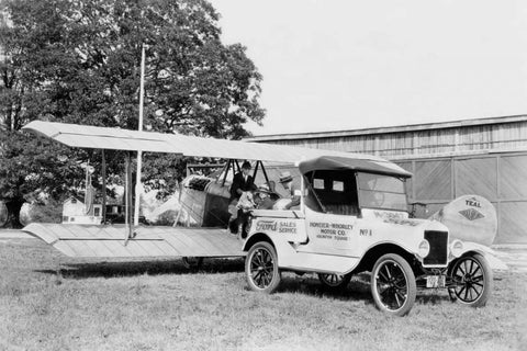 Ford Towing Plane White Modern Wood Framed Art Print with Double Matting by Unknown