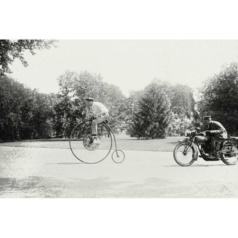 Motorcycle cop chases a Penny Farthing Velocipede White Modern Wood Framed Art Print by Unknown