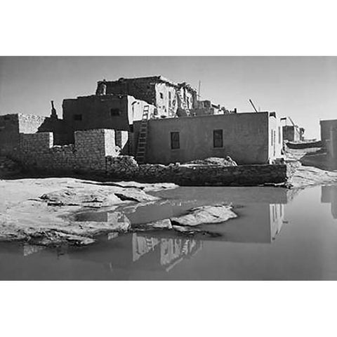 Adobe House with Water in Foreground - Acoma Pueblo, New Mexico - National Parks and Monuments, ca.  White Modern Wood Framed Art Print by Adams, Ansel