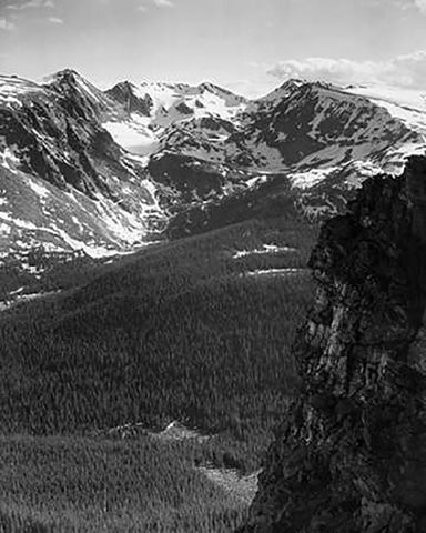 View of snow-capped mountain timbered area below, in Rocky Mountain National Park, Colorado, ca. 194 Black Ornate Wood Framed Art Print with Double Matting by Adams, Ansel