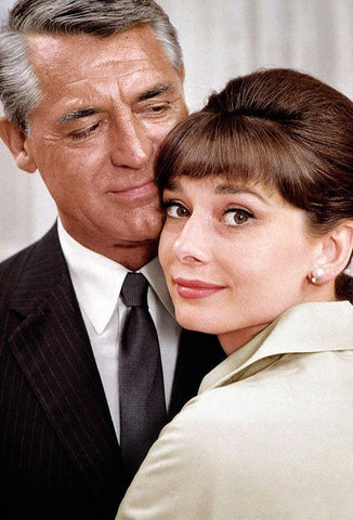 Cary Grant with Audrey Hepburn - Charade Black Ornate Wood Framed Art Print with Double Matting by Hollywood Photo Archive