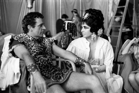 Behind the Scenes - Elizabeth Taylor - Cleopatra Black Ornate Wood Framed Art Print with Double Matting by Hollywood Photo Archive