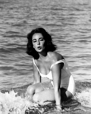 Elizabeth Taylor - In the surf Black Ornate Wood Framed Art Print with Double Matting by Hollywood Photo Archive