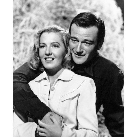 John Wayne with Jean Arthur White Modern Wood Framed Art Print by Hollywood Photo Archive