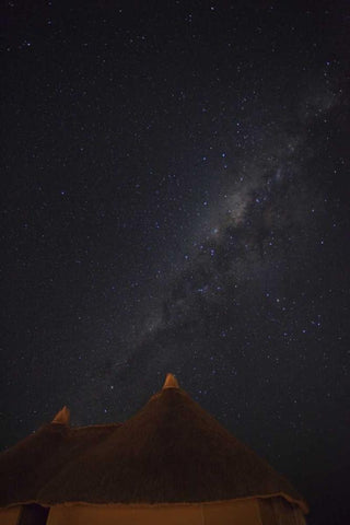 Namibia, Namib Desert, Milky Way above hut White Modern Wood Framed Art Print with Double Matting by Young, Bill