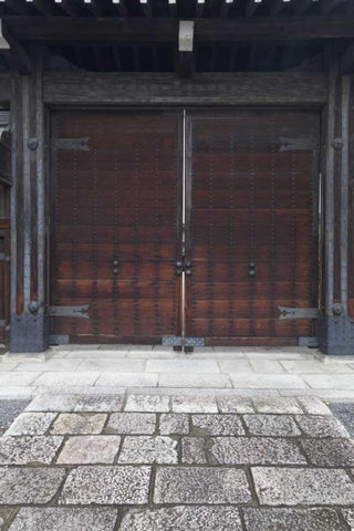 Japan, Kyoto Double wooden doors on building White Modern Wood Framed Art Print with Double Matting by Flaherty, Dennis