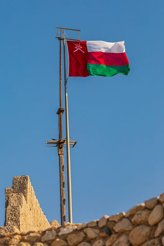 Middle East-Arabian Peninsula-Oman-Muscat-Muttrah-Omani flag flying in Muttrah Black Ornate Wood Framed Art Print with Double Matting by Wilson, Emily M.