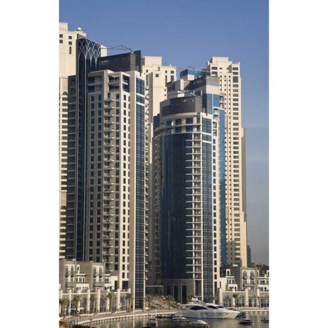 UAE, Dubai Marina towers with boats at anchor Black Modern Wood Framed Art Print with Double Matting by Young, Bill