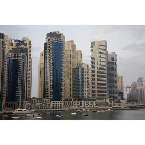 UAE, Dubai Modern buildings tower over boats Black Modern Wood Framed Art Print by Young, Bill