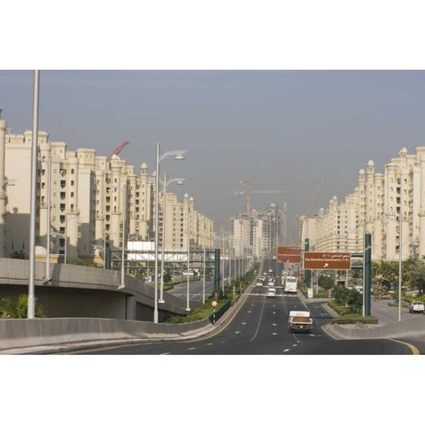 UAE, Dubai Road to the Palm Jumeirah complex Black Modern Wood Framed Art Print with Double Matting by Young, Bill