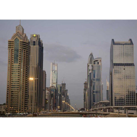 UAE, Dubai Towers along Sheik Zayed Road Black Modern Wood Framed Art Print with Double Matting by Young, Bill