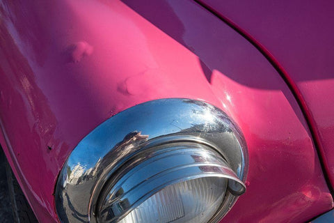 Detail of chrome head light on hot pink classic American Oldsmobile-Havana-Cuba Black Ornate Wood Framed Art Print with Double Matting by Miglavs, Janis