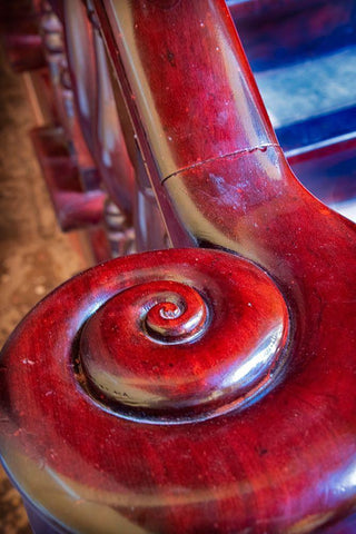 Snail shell-like curve on red wooden bannister handrail in Trinidad-Cuba White Modern Wood Framed Art Print with Double Matting by Miglavs, Janis