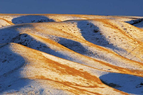 Canada, Alberta, Snow-covered hills at sunset White Modern Wood Framed Art Print with Double Matting by Grandmaison, Mike