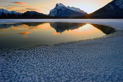 Snow crystals rim a lone break in the ice on Vermilion Lakes on a cold Banff National Park winter mo White Modern Wood Framed Art Print with Double Matting by Steve Mohlenkamp