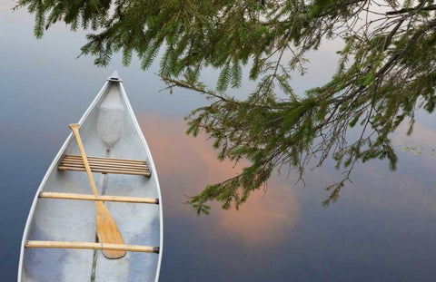 Canada, Quebec, Eastman Canoe on lake at sunset White Modern Wood Framed Art Print with Double Matting by Delisle, Gilles