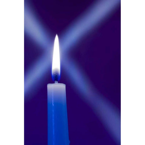 Burning candle with star burst on blue background Black Modern Wood Framed Art Print by Kaveney, Wendy