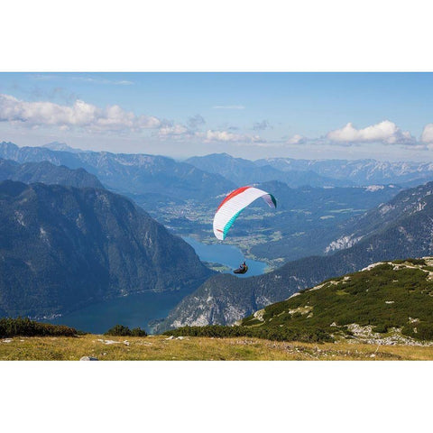 Austria-Dachstein-Paraglider soaring above Lake Hallstatt and the surrounding mountains Black Modern Wood Framed Art Print by Looney, Hollice
