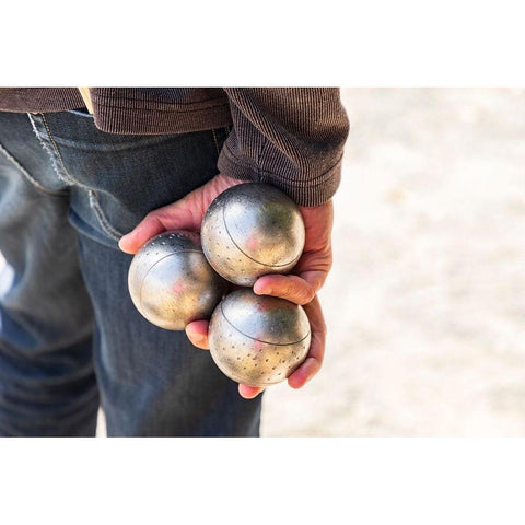 France-Haute-Vienne-Limoges Man playing boules in a park in Limoges Black Modern Wood Framed Art Print by Wilson, Emily
