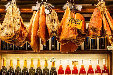 Italy-Rome Piazza della Rotunda-meat (hams) and wine for sale at Salami Antica White Modern Wood Framed Art Print with Double Matting by Jones, Alison