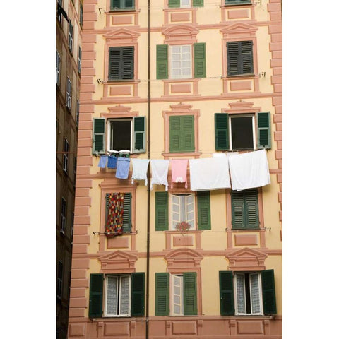 Italy, Camogli Laundry hangs across a building Black Modern Wood Framed Art Print by Kaveney, Wendy