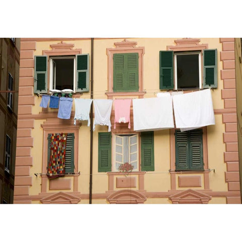 Italy, Camogli Laundry hangs across a building Black Modern Wood Framed Art Print by Kaveney, Wendy