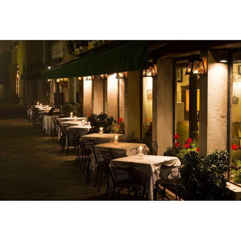 Italy, Venice Restaurant tables lit at night Black Modern Wood Framed Art Print by Young, Bill