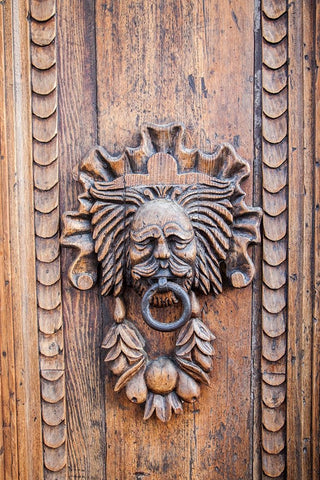 Italy- Umbria- Assisi. Ornate wood carved door knocker. Black Modern Wood Framed Art Print by Eggers, Julie