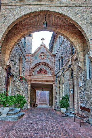 Italy- Umbria- Assisi. Archway and path leading to the Monastero della Santa Croce Catholic Church. Black Ornate Wood Framed Art Print with Double Matting by Eggers, Julie