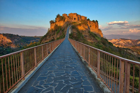 Italy- Tuscany. Evening light of Civita di Bagnoregio and the long bridge leading to town. White Modern Wood Framed Art Print with Double Matting by Eggers, Julie
