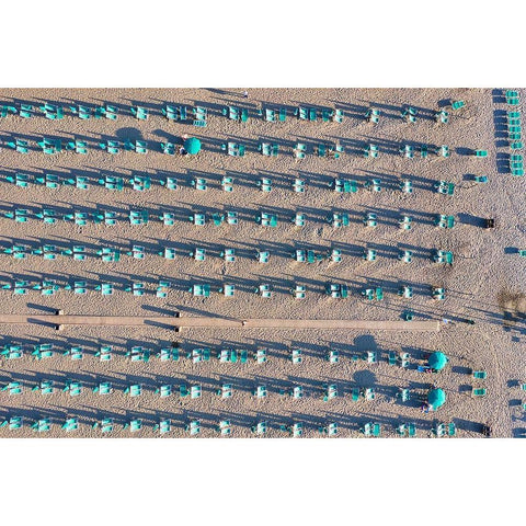 Italy-Tuscany-Torre del Lago Puccini-boathouse and neatly ordered beach chairs and umbrellas Black Modern Wood Framed Art Print by Molinari, Michele