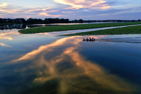 Italy-Mantova (Mantua) Sunset reflection and boat on lake Black Ornate Wood Framed Art Print with Double Matting by Molinari, Michele