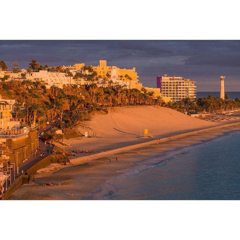 Canary Islands-Fuerteventura Island-Morro Jable-high angle view of Playa de la Cebada beach-sunset Gold Ornate Wood Framed Art Print with Double Matting by Bibikow, Walter