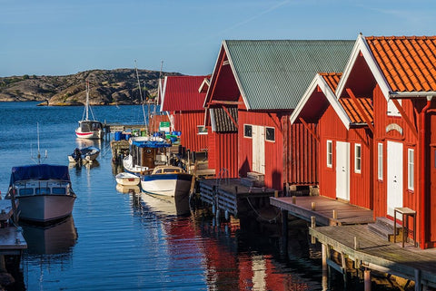 Sweden-Bohuslan-Kungshamn-red fishing shacks in the Fisketangen-old fishermans neighborhood Black Ornate Wood Framed Art Print with Double Matting by Bibikow, Walter