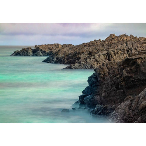 Lava rocks along tranquil shoreline of San Cristobal Island-Galapagos-Ecuador Gold Ornate Wood Framed Art Print with Double Matting by Jones, Adam