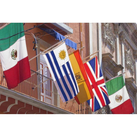 Mexico, Guanajuato Flags displayed from balcony Black Modern Wood Framed Art Print by Paulson, Don