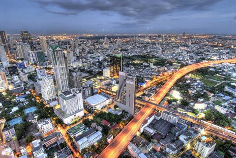 Thailand, Bangkok Overview of city at dusk Black Ornate Wood Framed Art Print with Double Matting by Shimlock, Jones