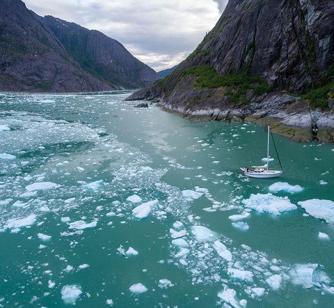Alaska-Aerial view S/V Abuelos motoring among icebergs floating near calving face of LeConte Glacier White Modern Wood Framed Art Print with Double Matting by Souders, Paul
