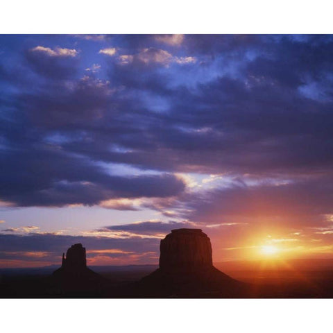 AZ, Monument Valley Sunrise on stone formations White Modern Wood Framed Art Print by Flaherty, Dennis