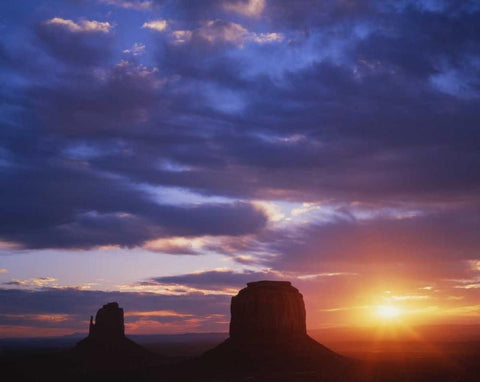 AZ, Monument Valley Sunrise on stone formations White Modern Wood Framed Art Print with Double Matting by Flaherty, Dennis