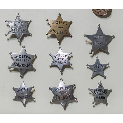 Arizona-Scottsdale Close-up of law enforcement badges from wild west  Black Modern Wood Framed Art Print by Jaynes Gallery