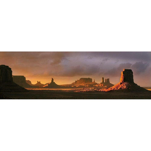 Last light bathes Monument Valley in deep oranges and lavenders on the Arizona-Utah border Gold Ornate Wood Framed Art Print with Double Matting by SMO