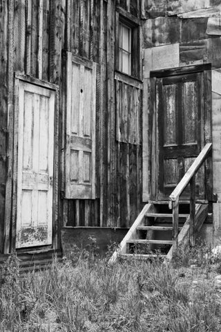 Colorado, St Elmo Weathered doors in building Black Ornate Wood Framed Art Print with Double Matting by Flaherty, Dennis