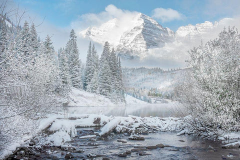 Winter comes to the maroon bells near Aspen Colorado in the Rocky Mountains Black Ornate Wood Framed Art Print with Double Matting by SMO