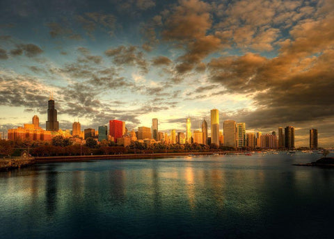 Chicago skyline over lake Michigan as sunrise enters a new day Black Ornate Wood Framed Art Print with Double Matting by SMO