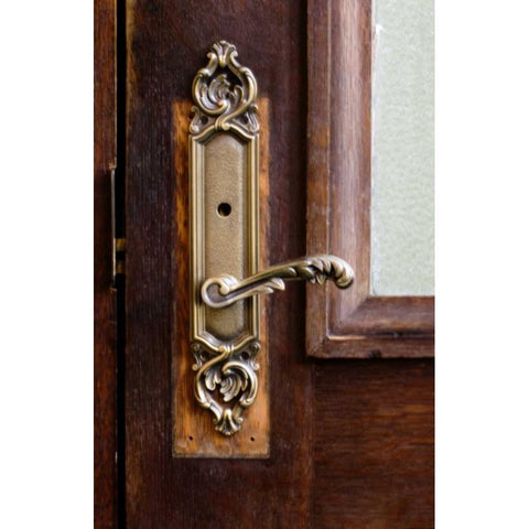 USA, Maine Ornate handle on wooden door White Modern Wood Framed Art Print by Clemons, Kathleen