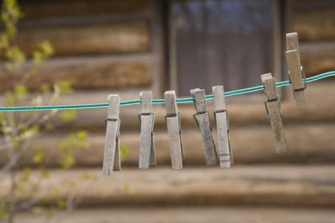 MT, Clothes pins on a clothesline by a log cabin Black Ornate Wood Framed Art Print with Double Matting by Paulson, Don
