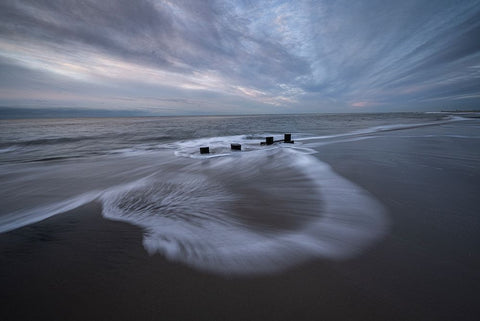 USA-New Jersey-Cape May National Seashore Pier stumps on cloudy seashore sunrise Black Ornate Wood Framed Art Print with Double Matting by Jaynes Gallery