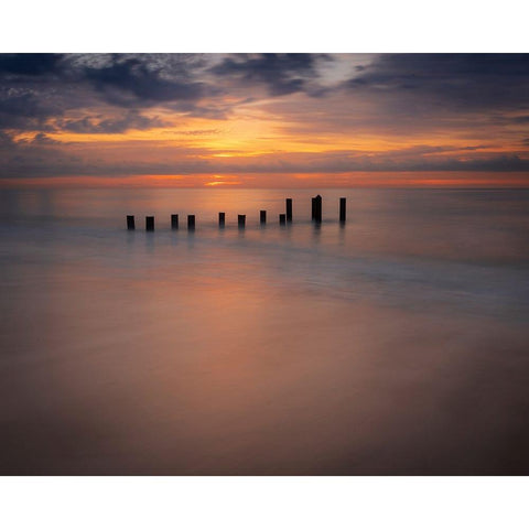USA-New Jersey-Cape May National Seashore Sunrise on pier posts on ocean shore Black Modern Wood Framed Art Print by Jaynes Gallery