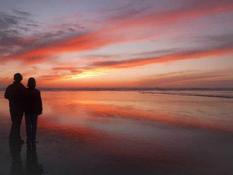 Oregon, Cannon Beach Couple on beach at sunset White Modern Wood Framed Art Print with Double Matting by Paulson, Don